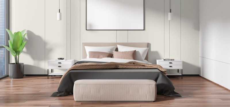 Minimalismus Schlafzimmer – Schlafzimmer mit klaren Linien und einladenden Textilien. 