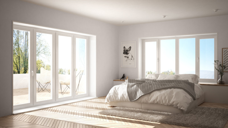 Minimalismus Schlafzimmer - Schlafzimmer mit kuscheligem Teppich.