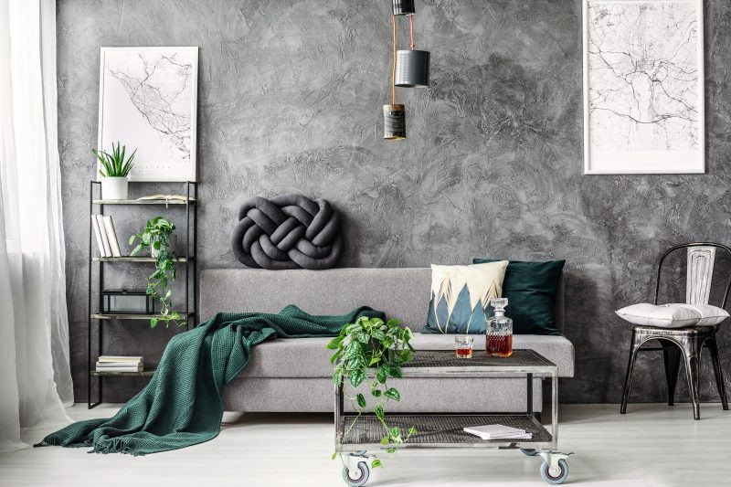 Industrial Style Wohnzimmer – Wohnzimmer mit grünen Akzenten.